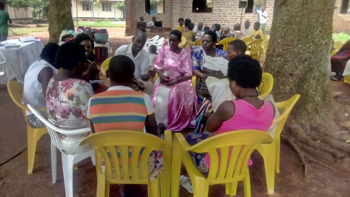 Community discussion circle with Uphold facilitators